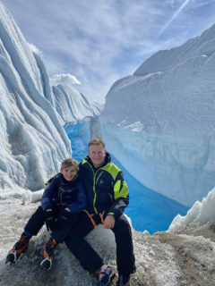 Harding and his son at an Antarctic glacier